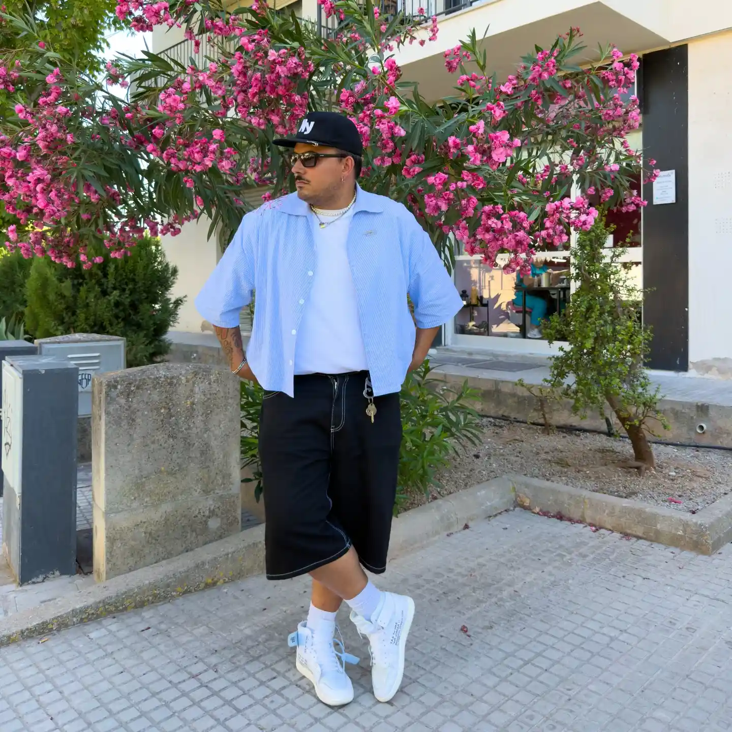 20 Vacation Outfits for Plus Size Men No One Tells You About 16 4. Striped Shirt with Wide Leg Shorts