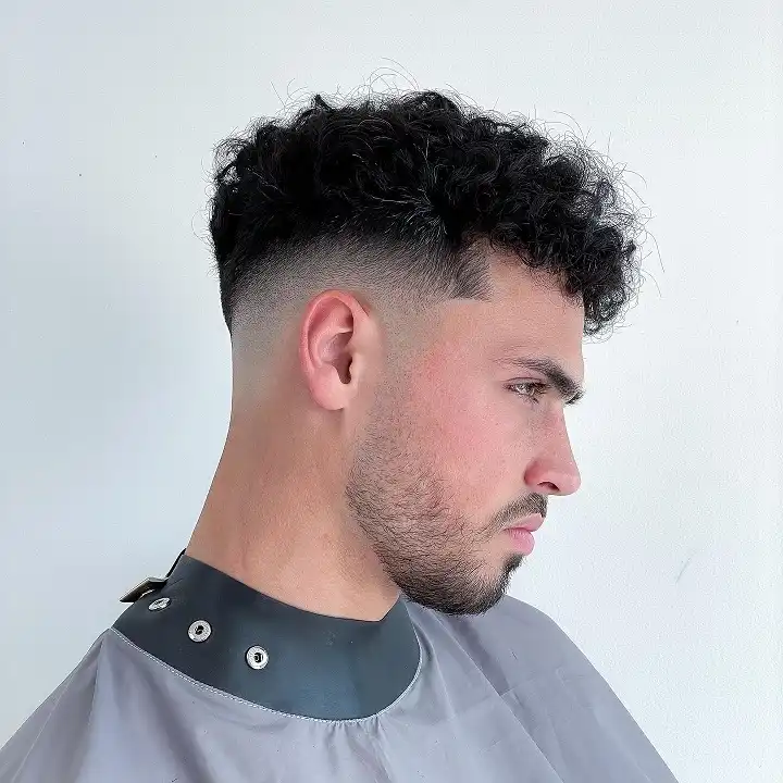 Short Curly Hair for Men: 23 Low-Effort Styles 12 High Skin Fade With a Sculpted Curl Crown