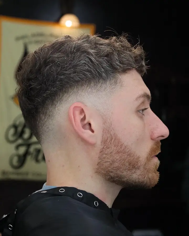 Short Curly Hair for Men: 23 Low-Effort Styles 11 Loose Wave Texture With a Mid Fade for Mature Curl Types