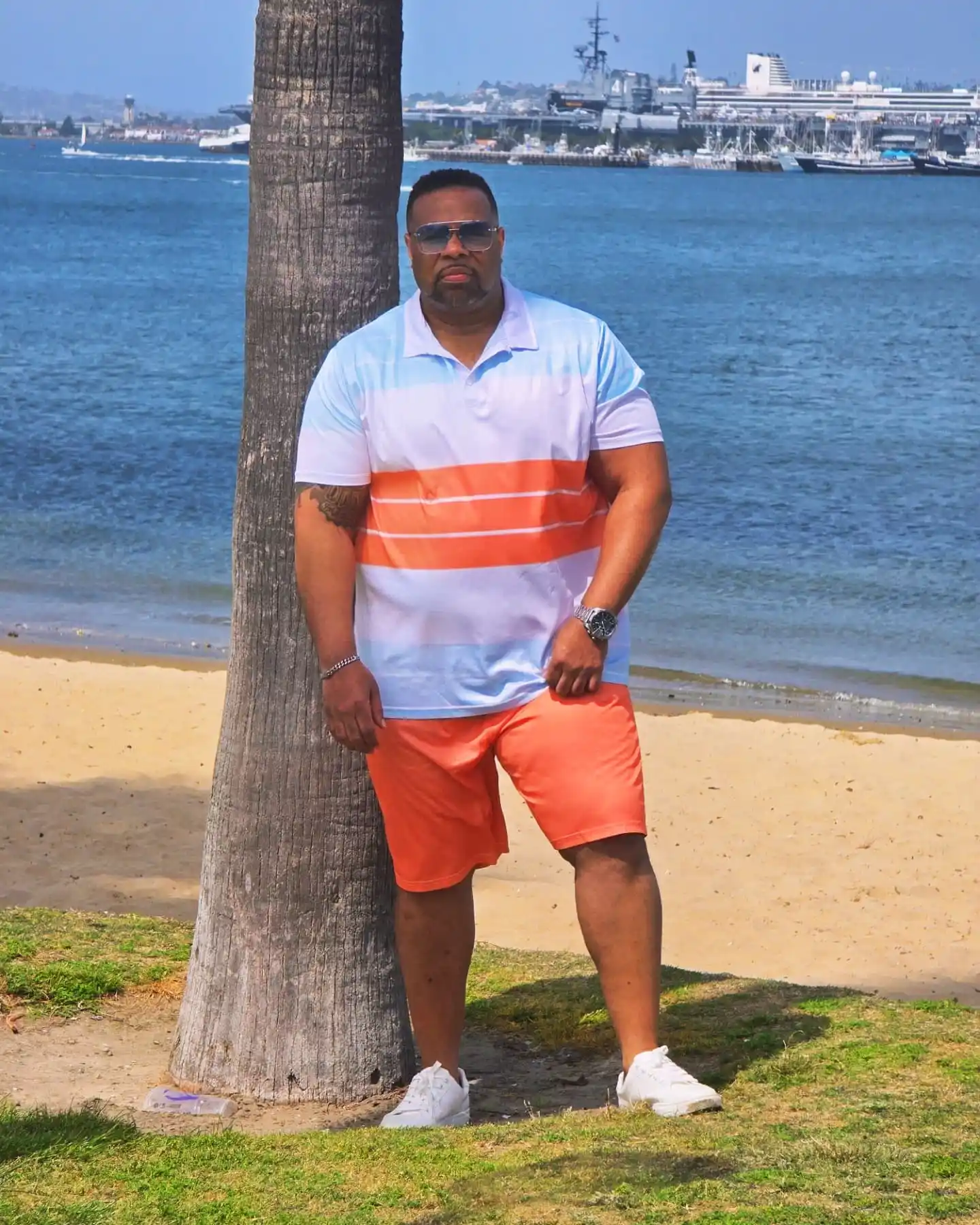 14 Streetwear Outfits for Plus Size Men Real Men Swear By 9 7. Striped Polo And Orange Shorts