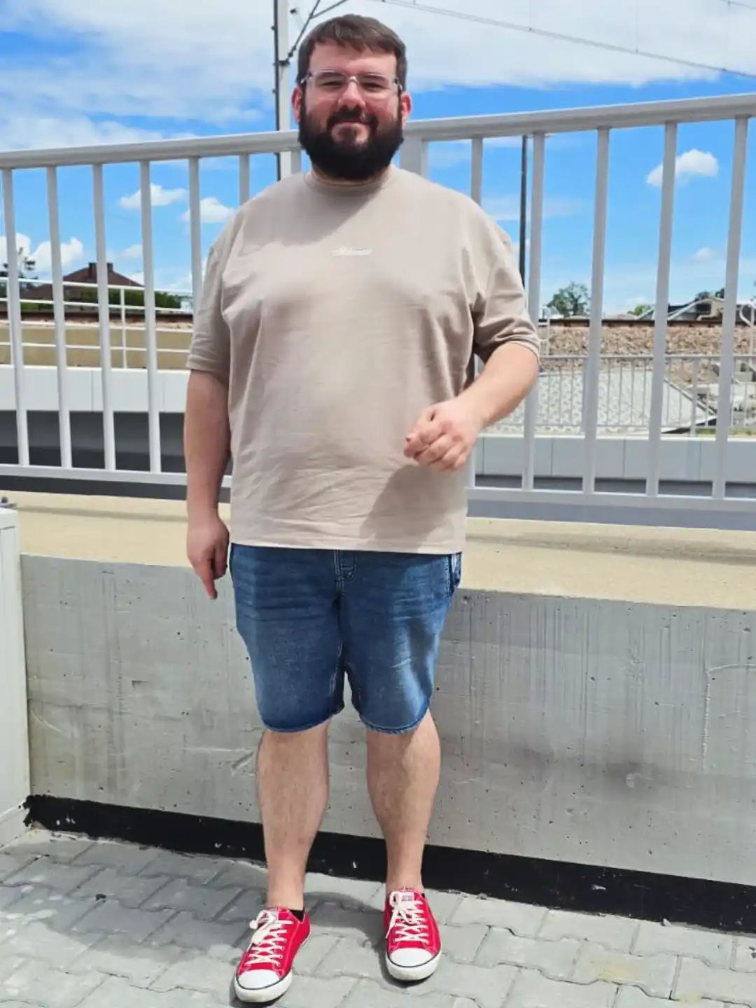 3. Oversized Tee with Denim Shorts