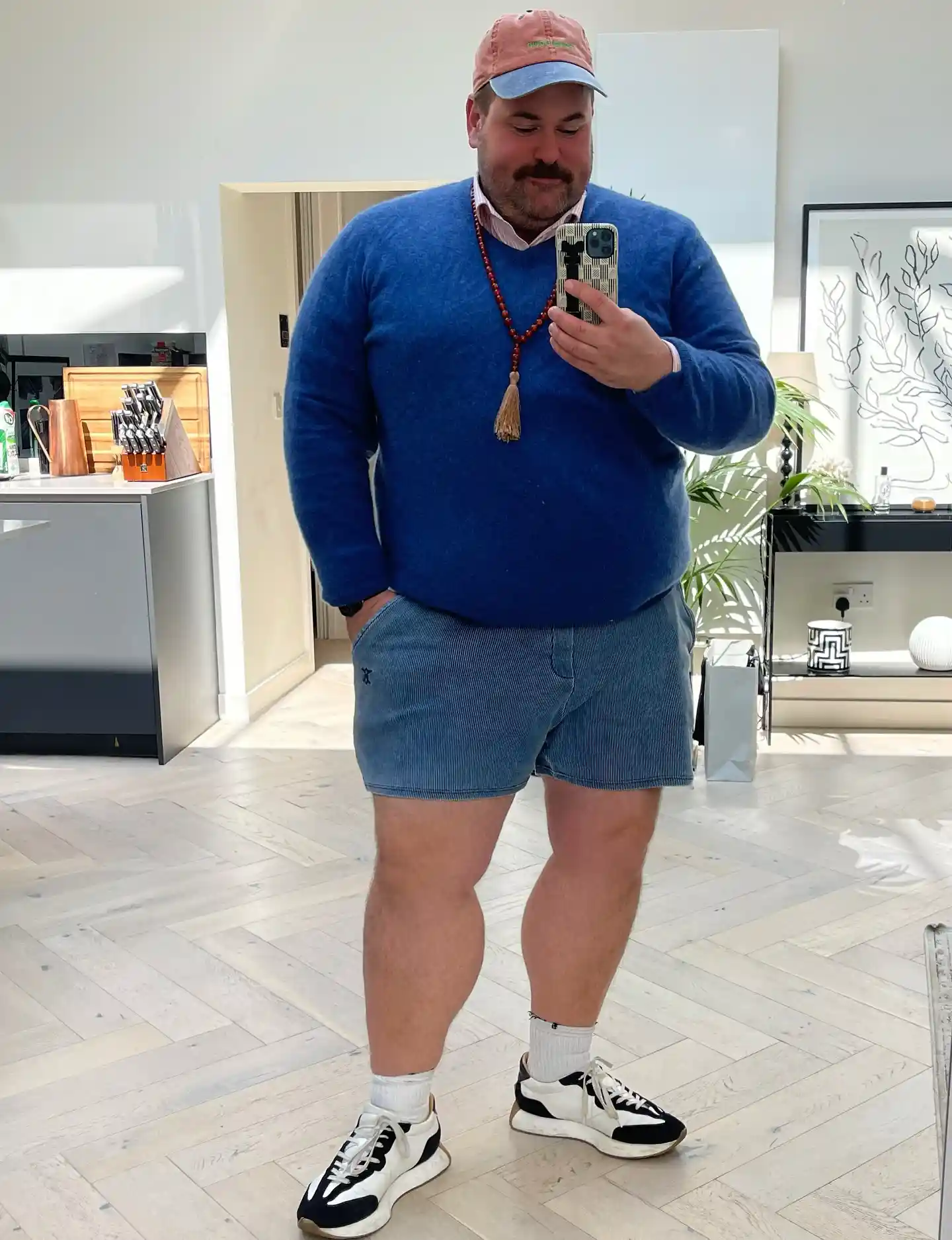 20 Vacation Outfits for Plus Size Men No One Tells You About 17 5. Blue Sweater with Corduroy Shorts