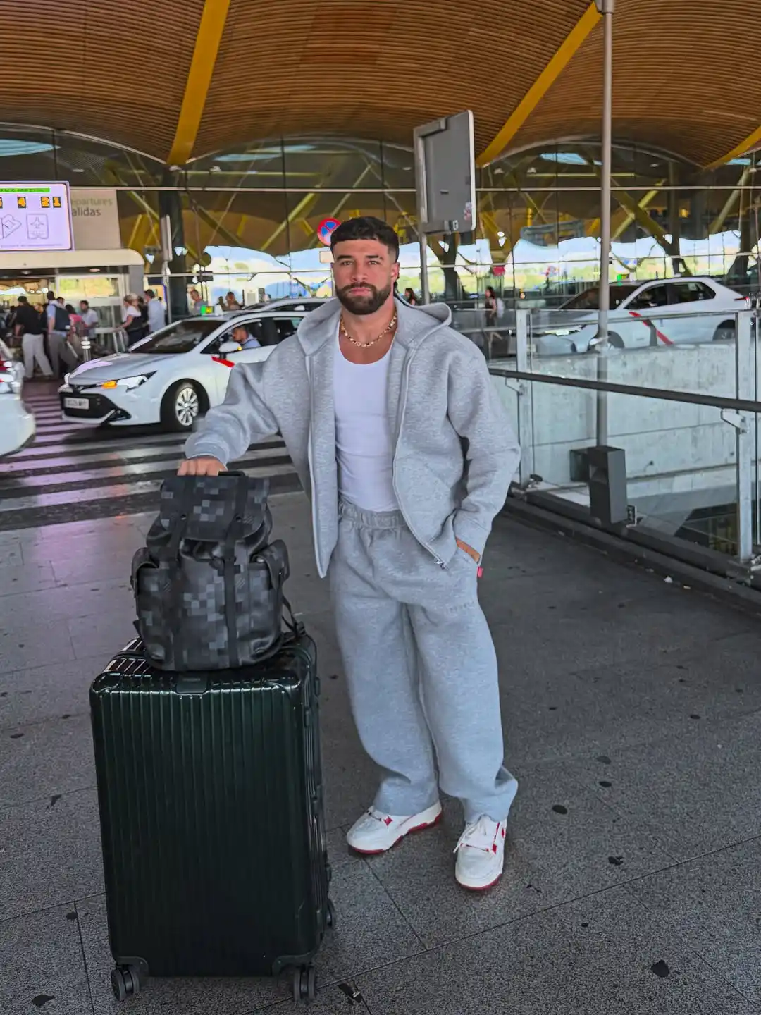 16 Airport Outfit Men Streetwear Looks for Travel Days 14 2. Grey Fleece Set with White Tank Top