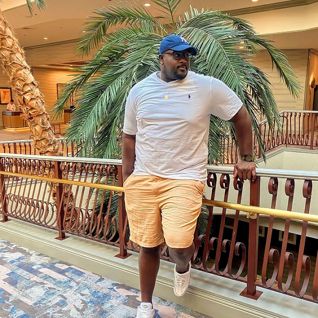 20 Big and Tall Outfit Ideas Nobody Tells You About 3 Warm Shorts And A Long Cut White Tee For Hot Days