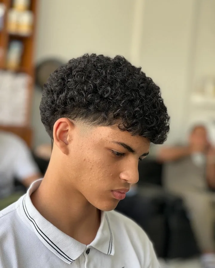 Short Curly Hair for Men: 23 Low-Effort Styles 6 Rounded Fringe Curls With a Barely-There Fade