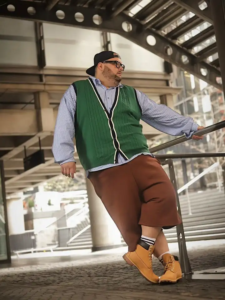 20 Vacation Outfits for Plus Size Men No One Tells You About 10 Green Knit Vest Over A Striped Shirt