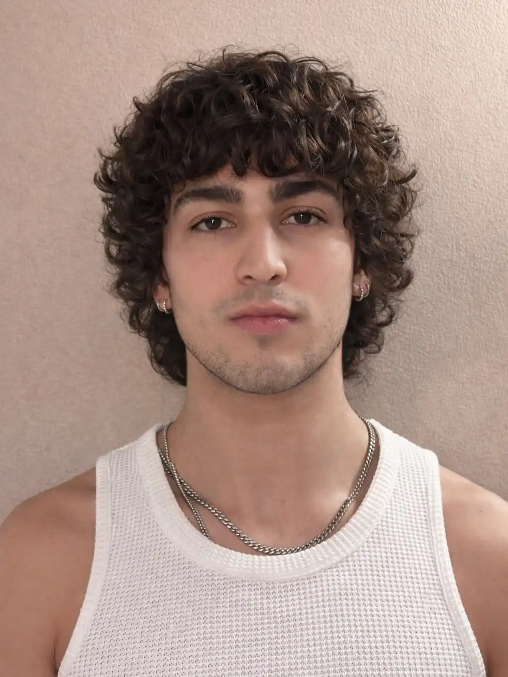 12. Face Framing Curly Shag With Bangs