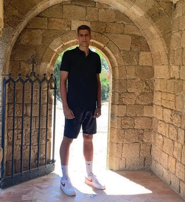 20 Big and Tall Outfit Ideas Nobody Tells You About 5 All Black Head To Toe, Broken By White Shoes