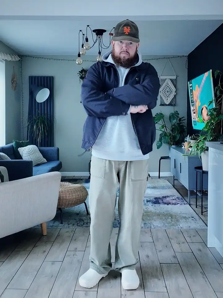 20 Vacation Outfits for Plus Size Men No One Tells You About 11 Navy Harrington Over Wide Leg Pants