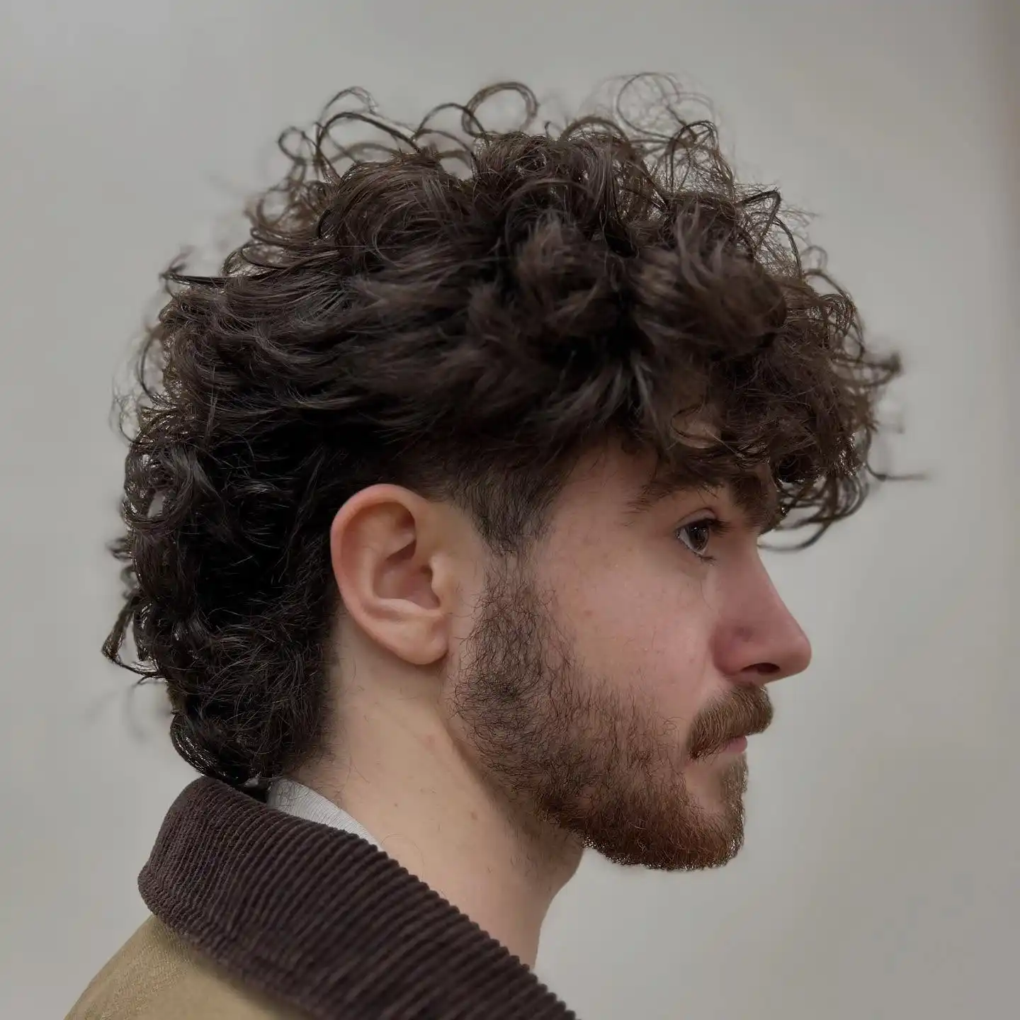 13. Windswept Curl Mullet