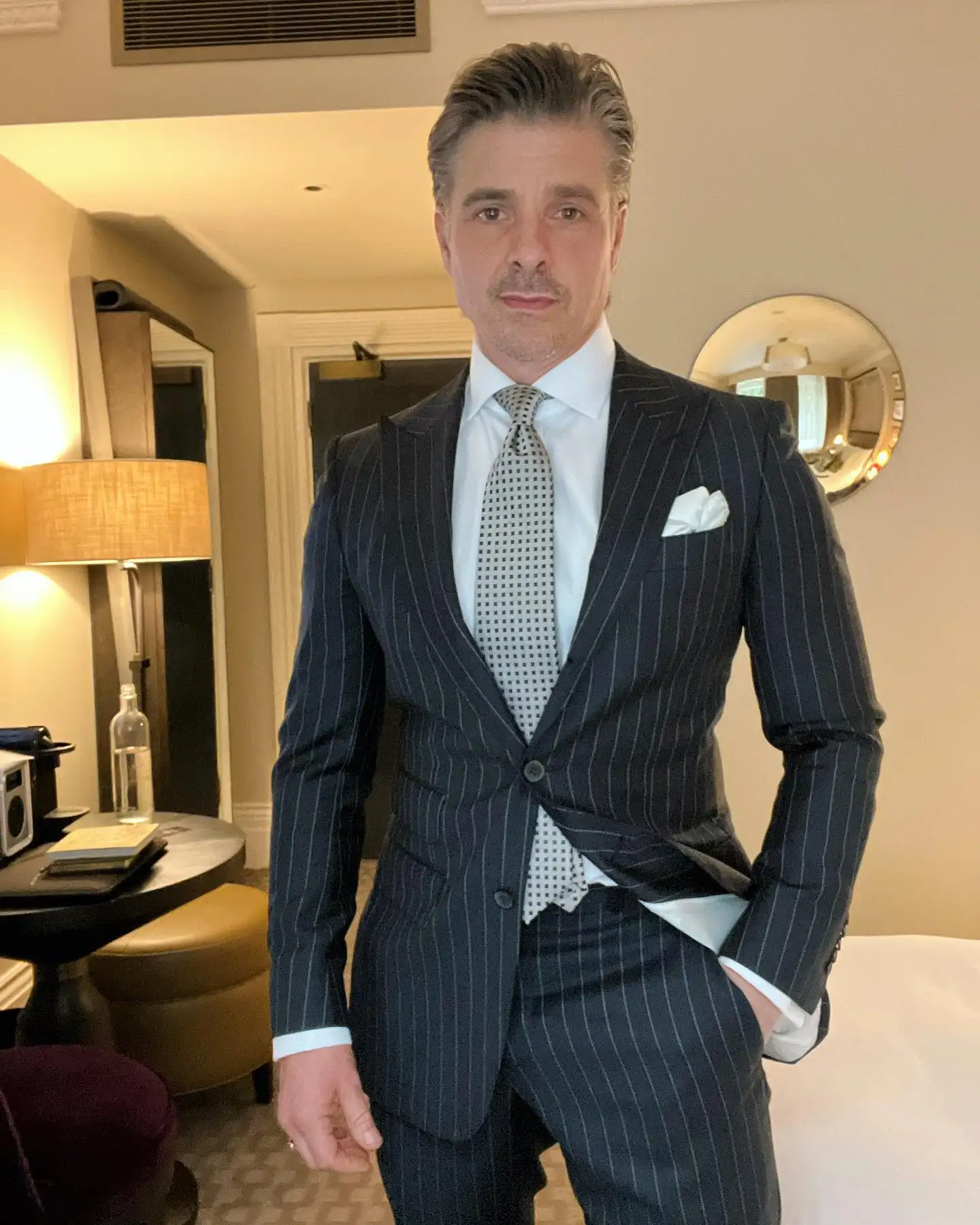 20 Suit Style Ideas for Tall Men That Look Proportional 11 A Tie That Actually Reaches Your Belt