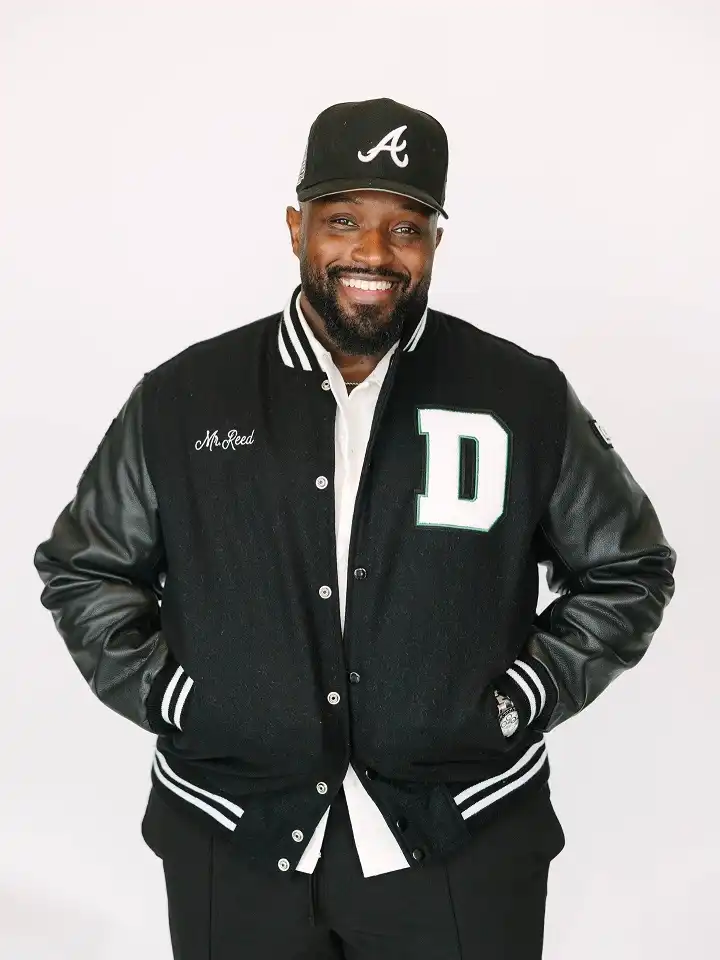 21 Winter Outfit Ideas for Plus Size Men That Actually Work 10 Varsity Jacket With a Crisp White Shirt