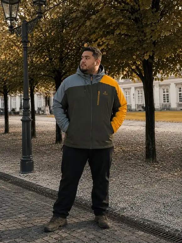 21 Winter Outfit Ideas for Plus Size Men That Actually Work 8 Colorblock Technical Jacket for Real Cold