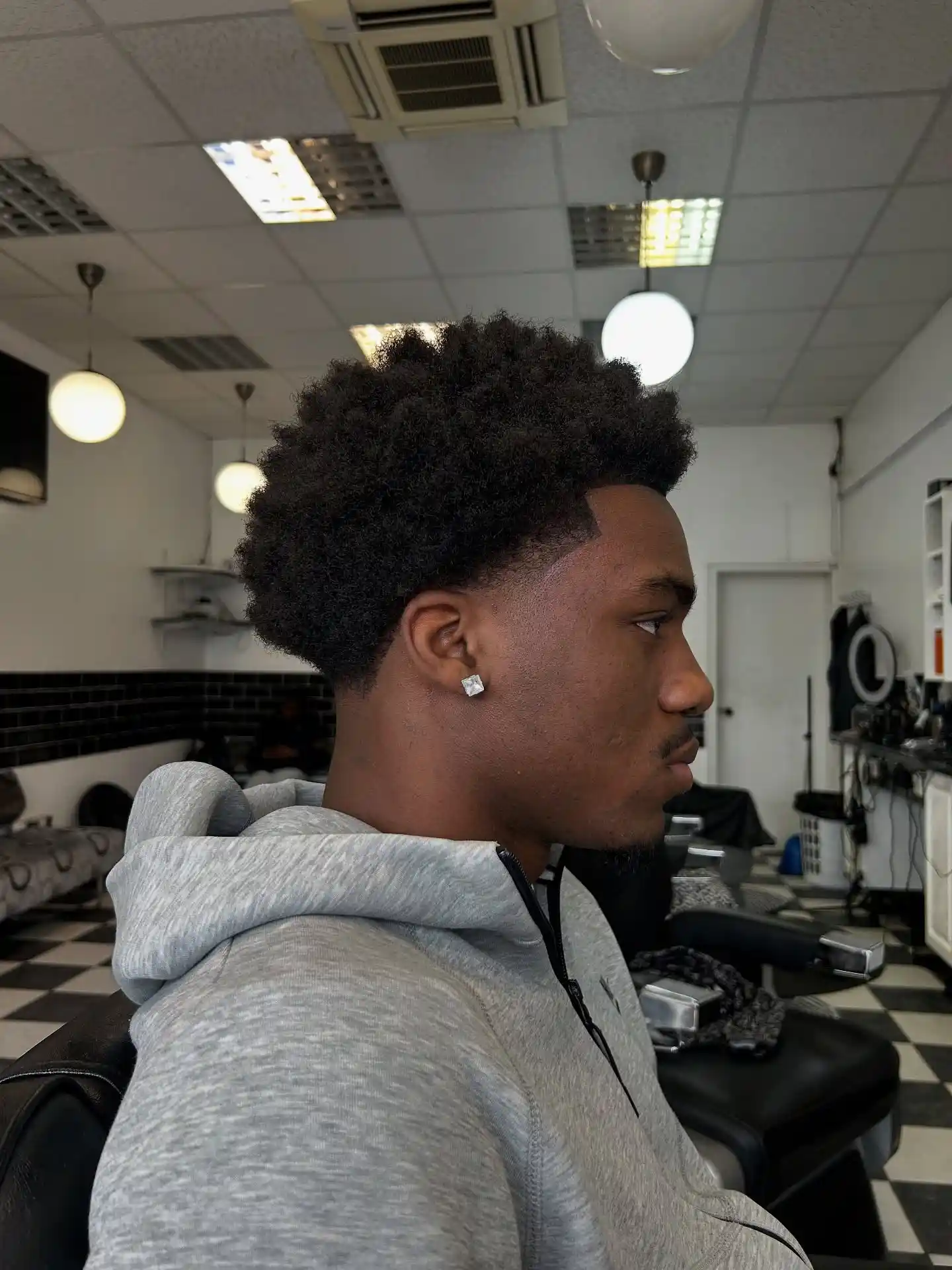 6. The Tall Top Fade with Curved Drop