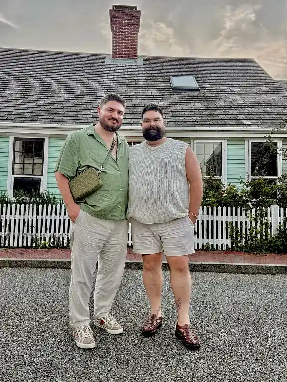 24 Travel Outfit Ideas for Plus Size Men Worth Saving Right Now 12 Linen Camp Shirt and a Knit Vest for a Warm Coastal Evening