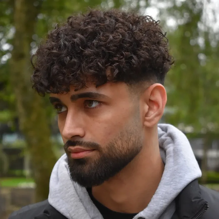 Short Curly Hair for Men: 23 Low-Effort Styles 7 Full Curl Volume Balanced by a Full Beard