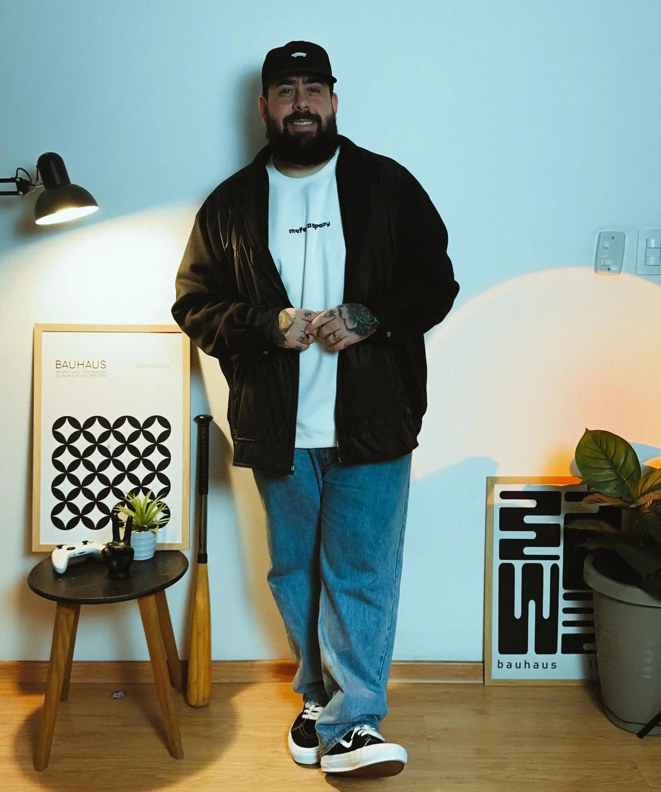 15 Effortless Outfit Ideas for Plus Size Men Real Men Swear By 8 7. Black Bomber Jacket, White Tee and Light Wash Jeans for an Easy Everyday Uniform
