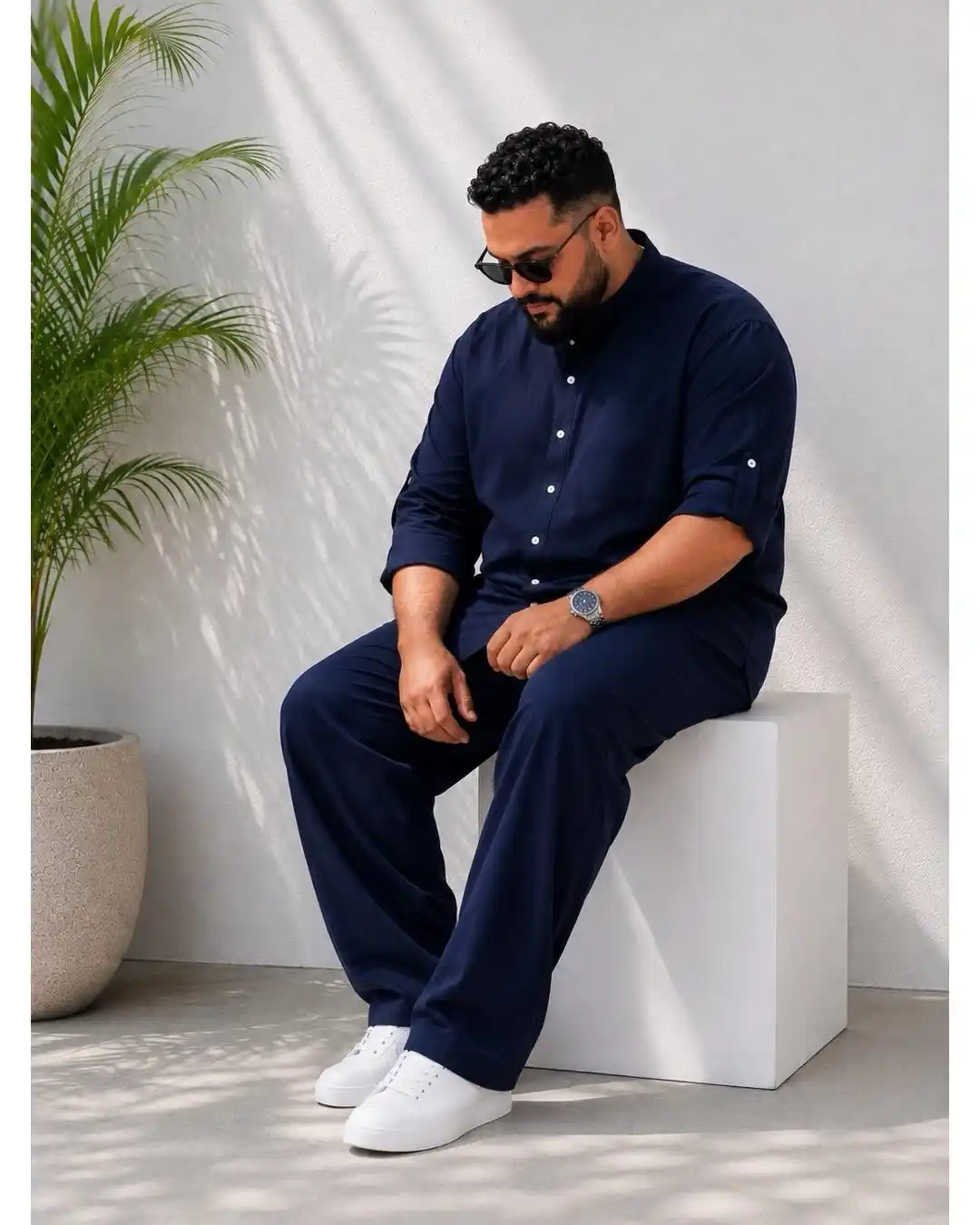 15 Effortless Outfit Ideas for Plus Size Men Real Men Swear By 3 2. Head to Toe Navy with White Sneakers for a Clean Minimalist Look
