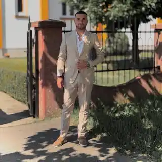 8. Khaki Summer Suit with Suede Loafers