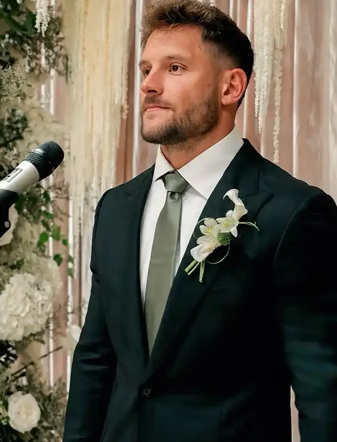 8. Black Suit with Sage Green Tie